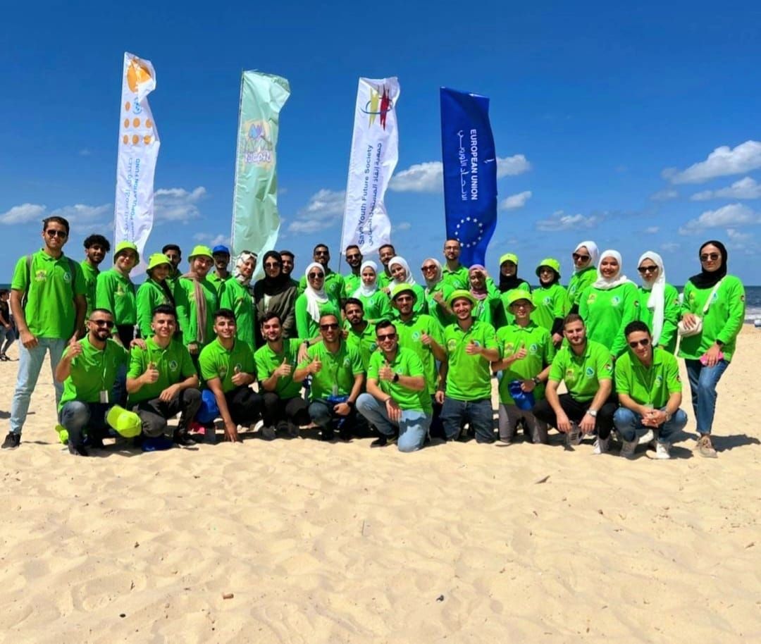Volunteer team at a beach event run with partner organisations